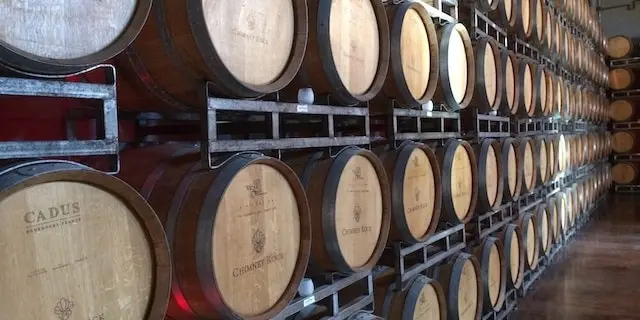 Barrels full of aging wine